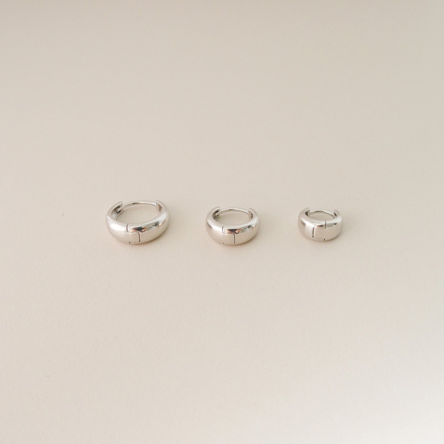 Tapered Huggie Hoops in Silver - toutjewellery