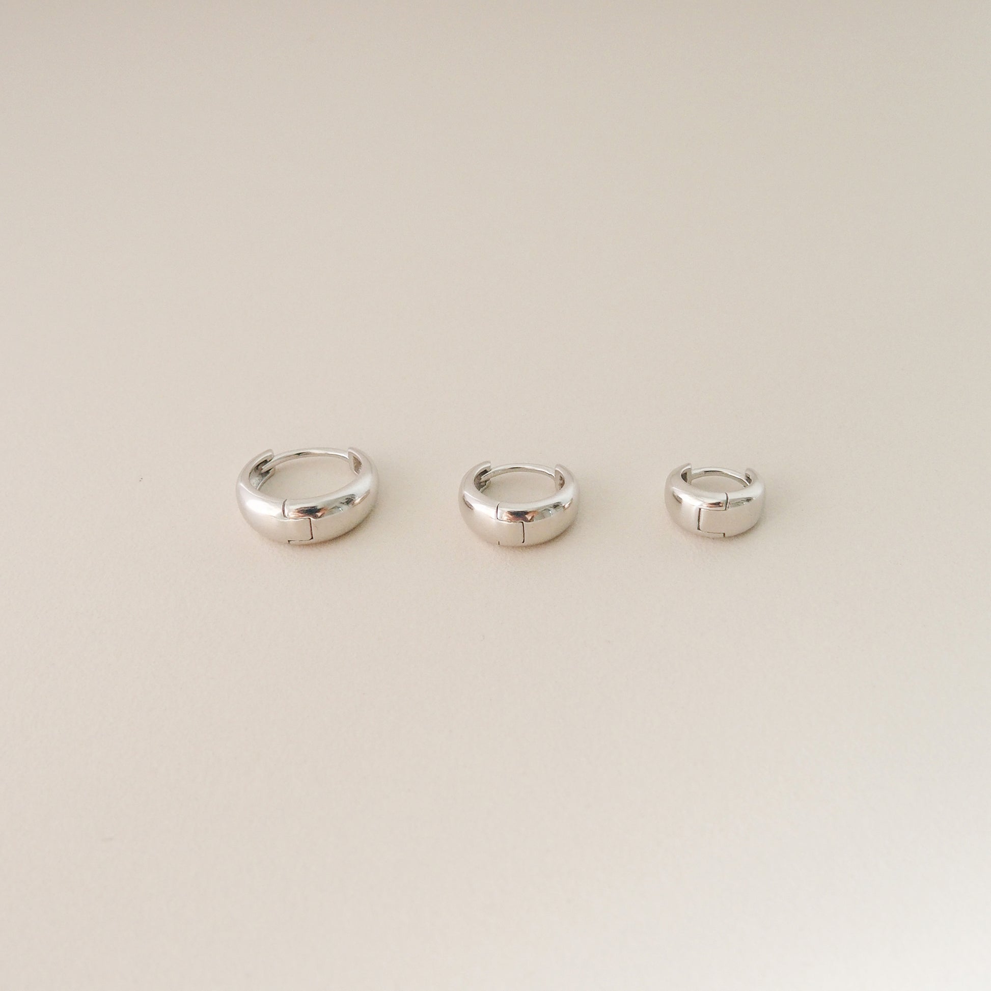 Tapered Huggie Hoops in Silver - toutjewellery