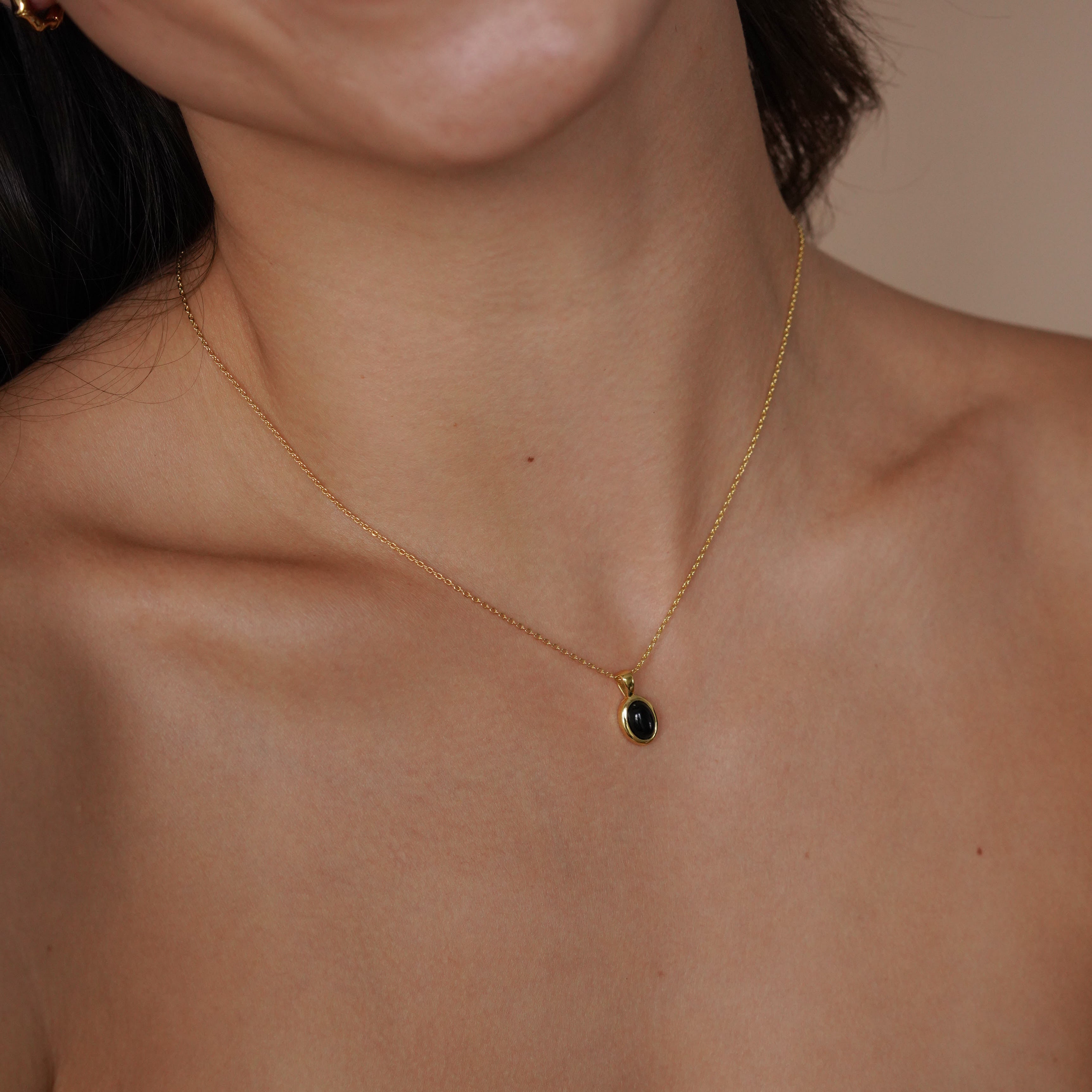 Onyx and gold on sale necklace