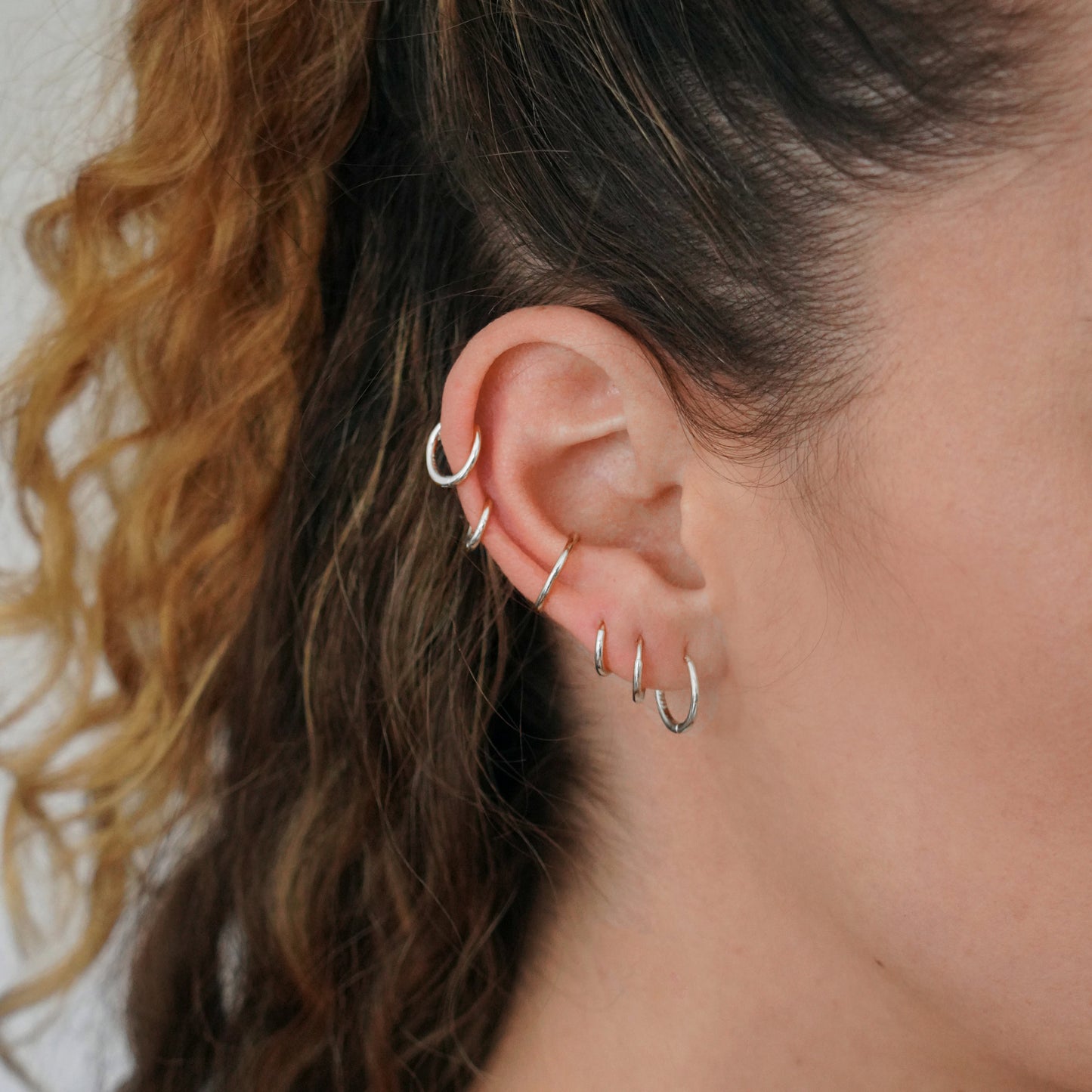 Tiny Huggie Hoop Earrings in Silver - toutjewellery