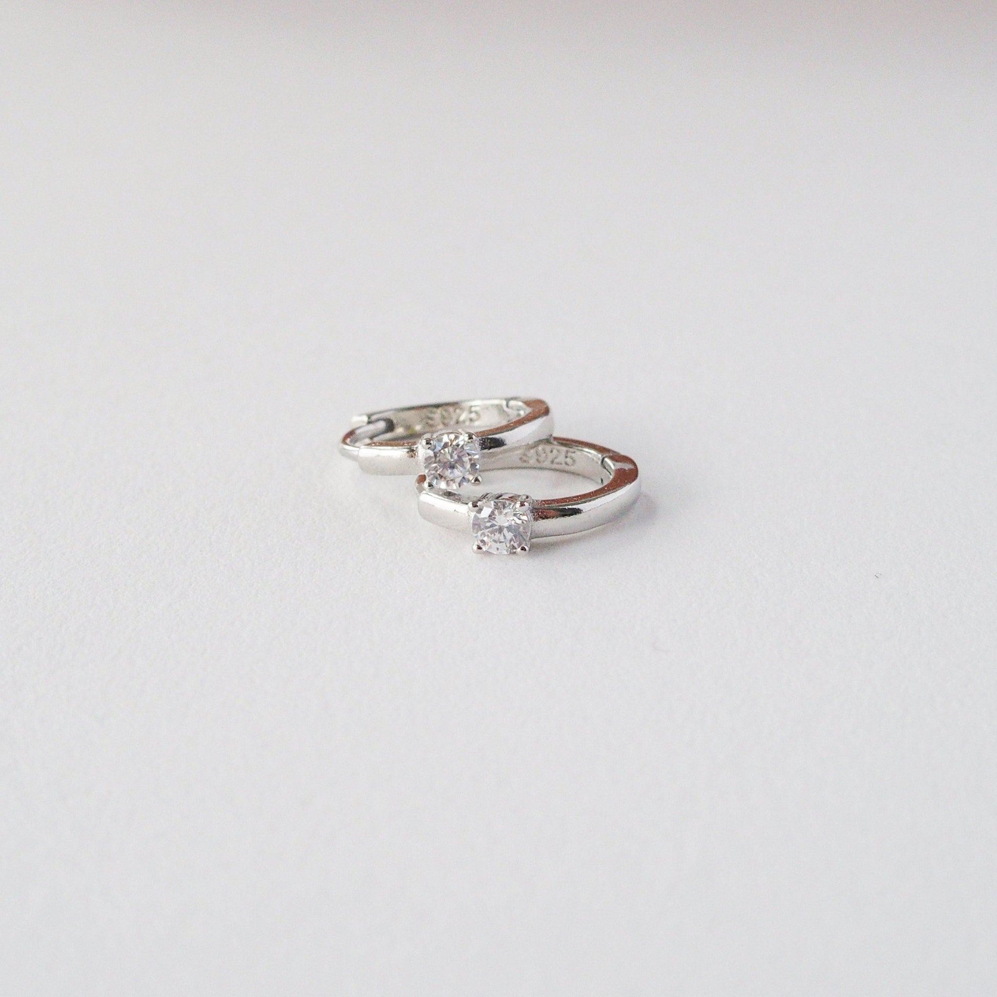 Solitaire Crystal Huggie Hoops in Silver - toutjewellery