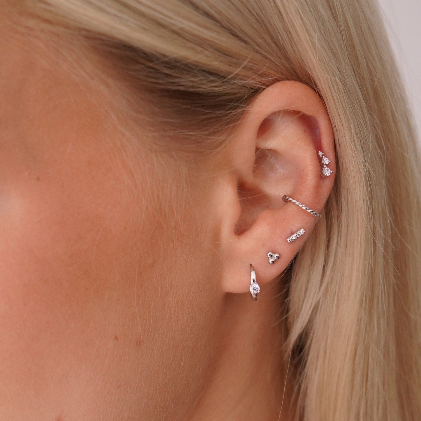 Solitaire Crystal Huggie Hoops in Silver - toutjewellery